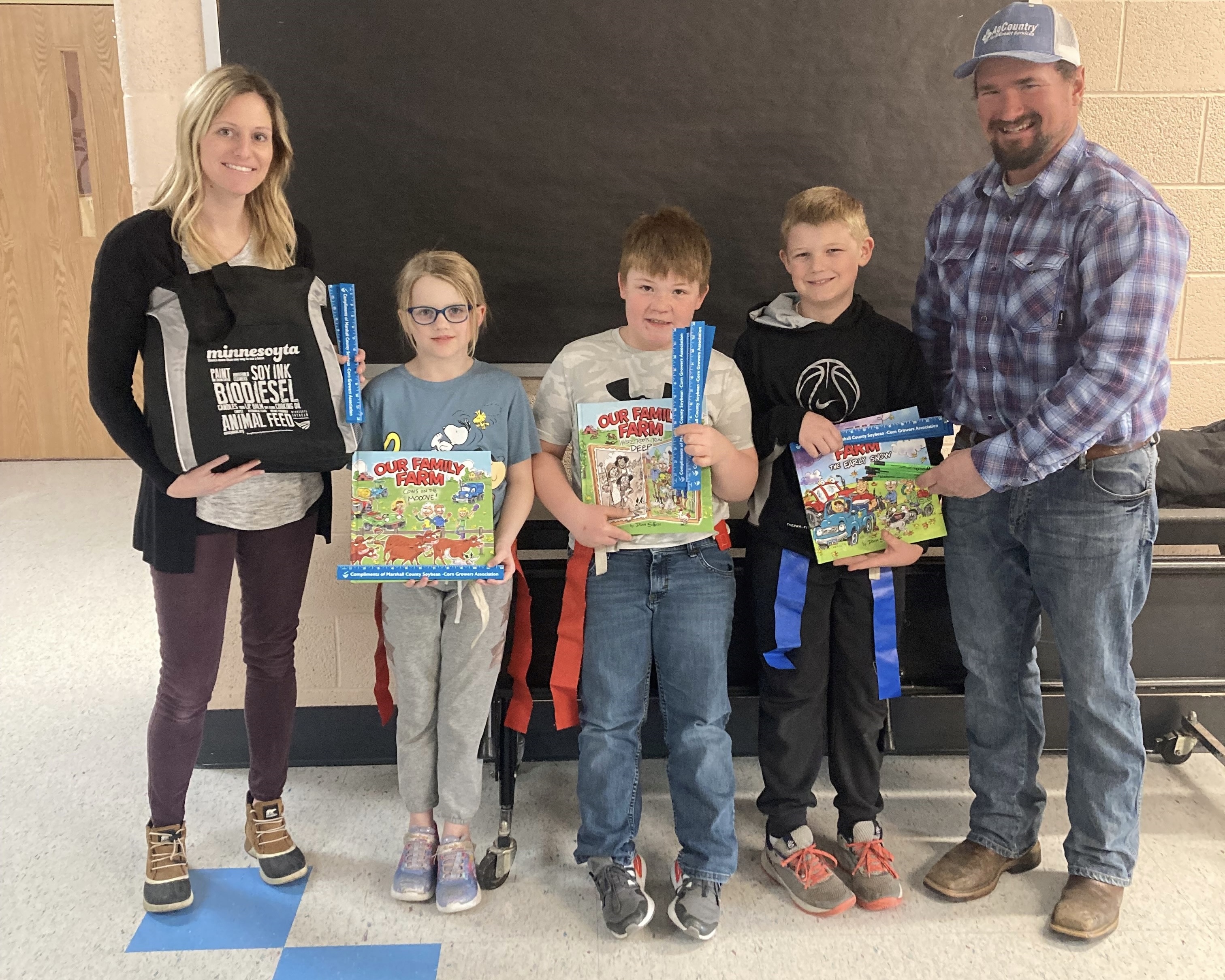Mark B. presenting books to Viking School